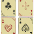collection of 4 vintage aces playing cards